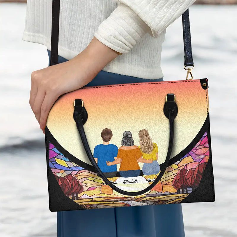 Gift For Women, Gift For Mother, Gift For Grandma, Single Mom, Mom - Daughters (Adult), Mom - Daughters (Young), Mom - Sons, Mom - Children, Grandma - Grandkids, Love - Grandma And Grandkids On The Moon - Personalized Leather Bag